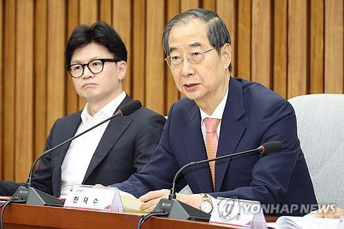 국민의힘 한동훈 대표와 한덕수 국무총리. 연합뉴스